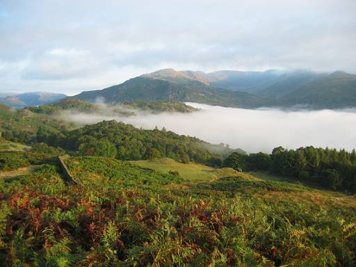 06_49-1.jpg - View from Loughrigg towards Fairfield showing the classic horseshoe and low mist over Windermere. I scouted this walk on the second hottest day of the year - and I really wished I hadn't.
